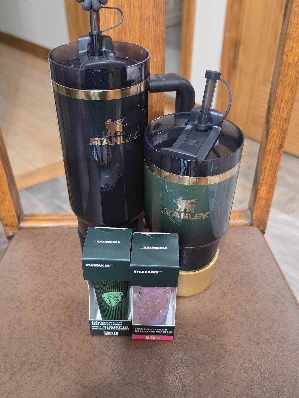 Stanley Black and Green Insulated Travel Mugs with Gold Accent
